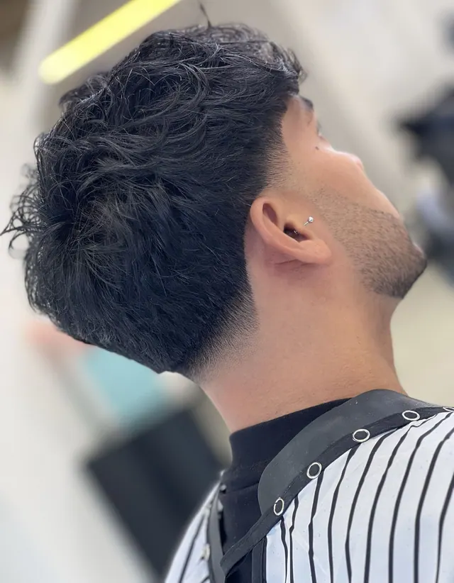 A messy textured cut with a taper